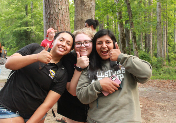 summer camp counselors smiling