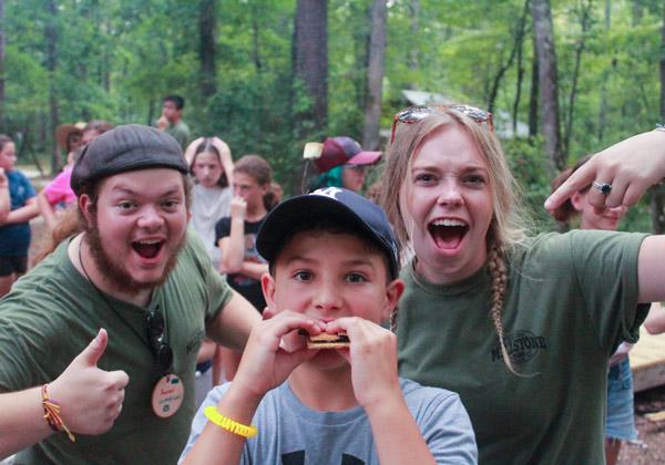 Millstone summer camp - campers making smores