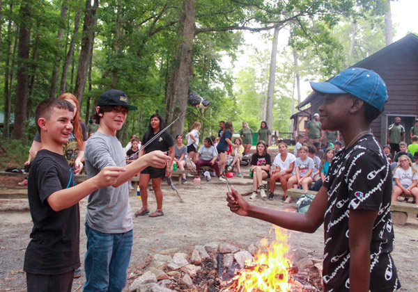 Millstone summer camp - campers by the campfire