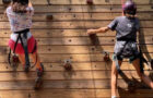 2 kids on the climbing wall